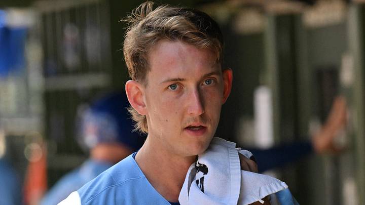Jun 19, 2026; Chicago, Illinois, USA; Chicago Cubs pitcher Ben Brown (32) looks on from the dugout against the Toronto Blue Jays during the first inning at Wrigley Field. Mandatory Credit: Patrick Gorski-Imagn Images