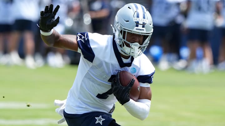 Dallas Cowboys receiver Traeshon Holden carries the ball during training camp at the River Ridge Fields. 