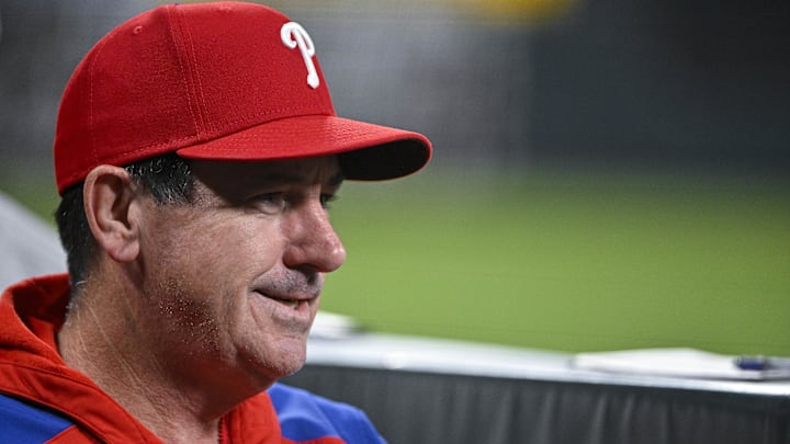  Philadelphia Phillies manager Rob Thomson (59) looks on from the dugout during the first inning against the St. Louis Cardinals at Busch Stadium.