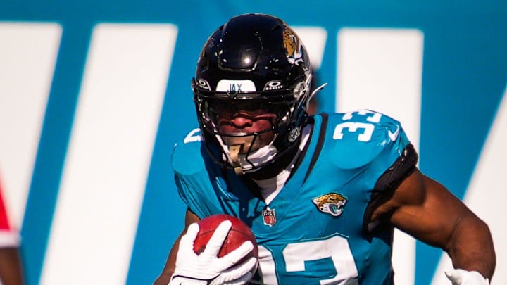 Jacksonville Jaguars running back Bhayshul Tuten (33) returns a kick off in the first quarter during an NFL football game at EverBank Stadium, Sunday, Dec. 14, 2025, in Jacksonville, Fla. [Doug Engle/Florida Times-Union]