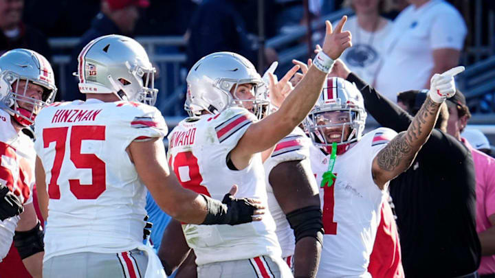 Ohio State Buckeyes quarterback Will Howard (18) celebrates a first down run during the NCAA football game against the Penn State Nittany Lions at Beaver Stadium in University Park, Pa. on Monday, Nov. 4, 2024. Ohio State won 20-13.