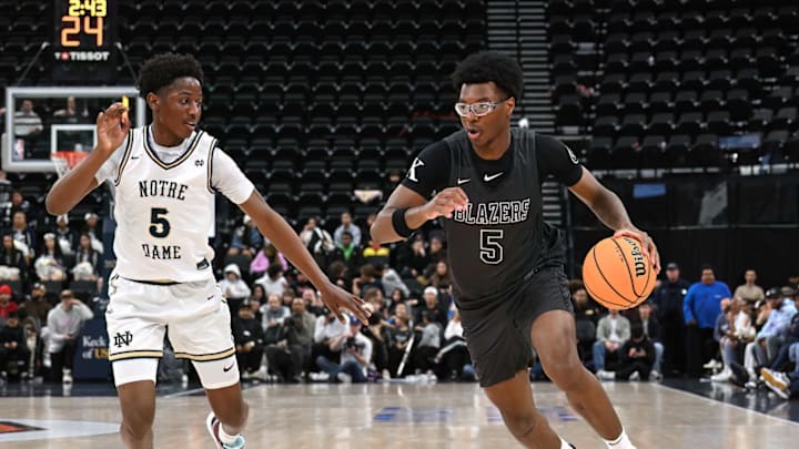 Sierra Canyon’s Bryce James (right) drives against NaVorro Bowman Jr. of Notre Dame/Sherman Oaks at the Intuit Dome.