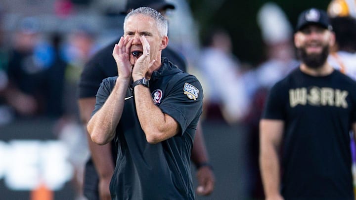 Florida State Seminoles head coach Mike Norvell leads warmups before the Seminoles take on the LSU Tigers on Sunday, Sept. 3, 2023 at Camping World Stadium.