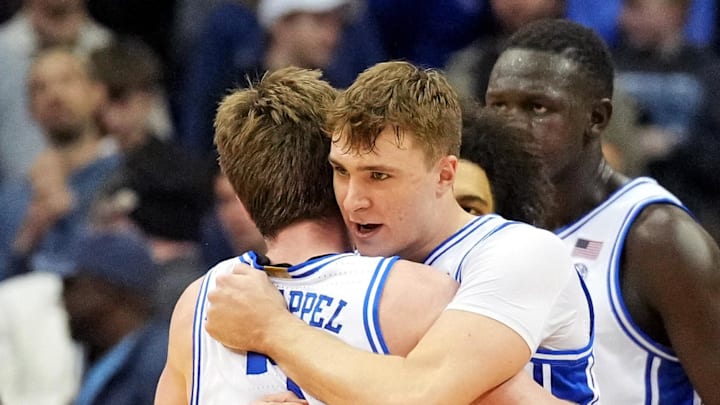 Mar 29, 2025; Newark, NJ, USA; Duke Blue Devils forward Cooper Flagg (2) celebrates with guard Kon Knueppel (7) after a play during the first half against the Alabama Crimson Tide in the East Regional final of the 2025 NCAA tournament at Prudential Center. Mandatory Credit: Robert Deutsch-Imagn Images
