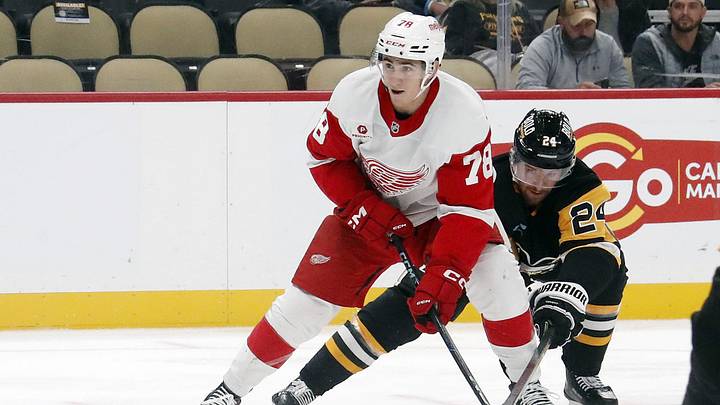Oct 1, 2024; Pittsburgh, Pennsylvania, USA; Detroit Red Wings center Amadeus Lombardi (78) skates in on goal against Pittsburgh Penguins defenseman Matt Grzelcyk (24) during the second period at PPG Paints Arena. Mandatory Credit: Charles LeClaire-Imagn Images Oct 1, 2024; Pittsburgh, Pennsylvania, USA; Detroit Red Wings center Amadeus Lombardi (78) skates in on goal against Pittsburgh Penguins defenseman Matt Grzelcyk (24) during the second period at PPG Paints Arena. Mandatory Credit: Charles LeClaire-Imagn Images