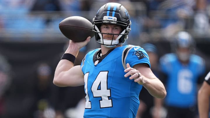 Oct 26, 2025; Charlotte, North Carolina, USA; Carolina Panthers quarterback Andy Dalton (14) throws during the first half against the Buffalo Bills at Bank of America Stadium. Mandatory Credit: Jim Dedmon-Imagn Images