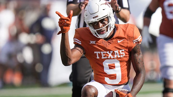 Texas Longhorns wide receiver Isaiah Neyor (9) points toward a first down