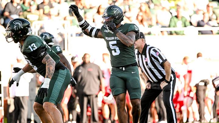 Michigan State’s Jordan Hall signals before a play against Nebraska during the first quarter on Saturday, Sept. 26, 2026, in East Lansing. Michigan State’s Jordan Hall signals before a play against Nebraska during the first quarter on Saturday, Sept. 26, 2026, in East Lansing.