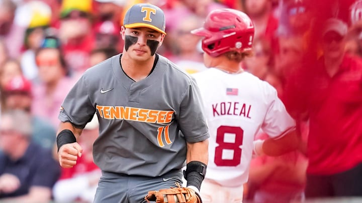 Tennessee's Andrew Fischer (11) pumps his fist after completing a double play to end the inning during game one of the NCAA baseball tournament Fayetteville Super Regional between Tennessee and Arkansas held at Baum-Walker Stadium on Saturday, June 7, 2025. Tennessee's Andrew Fischer (11) pumps his fist after completing a double play to end the inning during game one of the NCAA baseball tournament Fayetteville Super Regional between Tennessee and Arkansas held at Baum-Walker Stadium on Saturday, June 7, 2025.