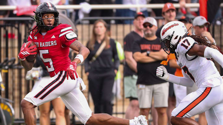 Texas Tech's Caleb Douglas looks back before scoring a touchdown against Oregon State during a non-conference football game, Saturday, Sept. 13, 2025, at Jones AT&T Stadium.