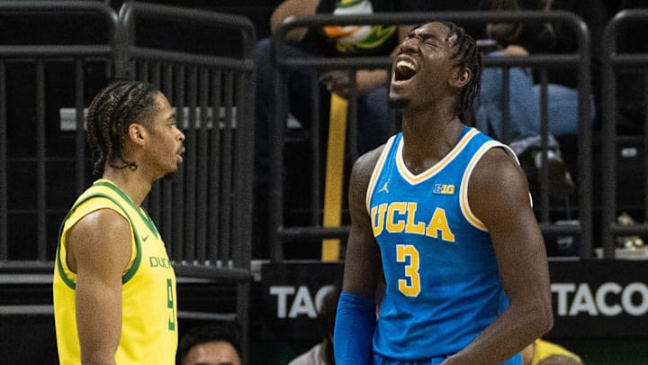 Oregon’s Keeshawn Barthelemy watches as UCLA’s Eric Dailey Jr. celebrates a play against the Ducks during the second half.