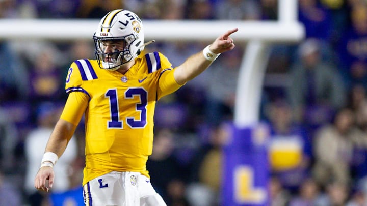 Nov 23, 2024; Baton Rouge, Louisiana, USA;  LSU Tigers quarterback Garrett Nussmeier (13) signals a first down against the Vanderbilt Commodores during the second half at Tiger Stadium. Mandatory Credit: Stephen Lew-Imagn Images