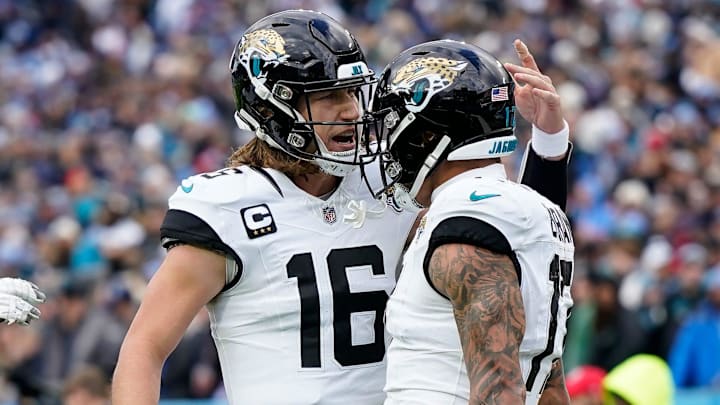 Jacksonville Jaguars tight end Evan Engram (17) celebrates his touchdown against the Tennessee