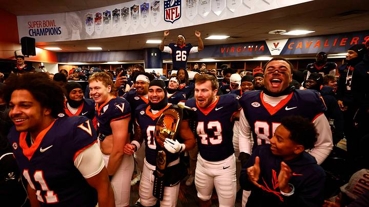 The Cavaliers celebrate winning the Commonwealth Cup against Virginia Tech, Nov. 29, 2025. The Cavaliers celebrate winning the Commonwealth Cup against Virginia Tech, Nov. 29, 2025.