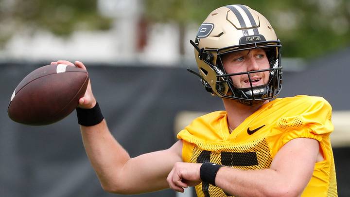 Purdue Boilermakers quarterback Ryan Browne (15) throws the ball. Purdue Boilermakers quarterback Ryan Browne (15) throws the ball.