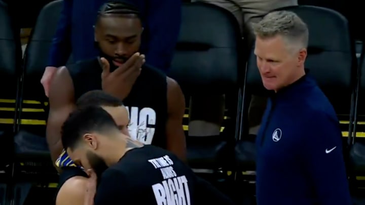 Steve Kerr waits patiently to talk to Jayson Tatum