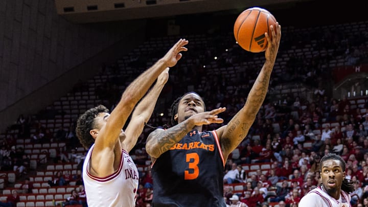 Dec 3, 2024; Bloomington, Indiana, USA; Sam Houston State Bearkats guard Lamar Wilkerson (3) shoots the ball while Indiana Hoosiers guard Anthony Leal (3) defends in the second half at Simon Skjodt Assembly Hall. Mandatory Credit: Trevor Ruszkowski-Imagn Images