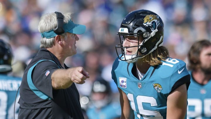 Jacksonville Jaguars head coach Doug Pederson talks with Jacksonville Jaguars quarterback Trevor