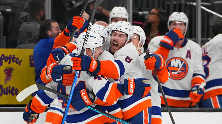 Nov 13, 2025; Las Vegas, Nevada, USA; New York Islanders center Jean-Gabriel Pageau (44) celebrates with team mates after scoring a short-handed goal against the Vegas Golden Knights during an overtime period to give the Islanders a 4-3 victory at T-Mobile Arena. Mandatory Credit: Stephen R. Sylvanie-Imagn Images Nov 13, 2025; Las Vegas, Nevada, USA; New York Islanders center Jean-Gabriel Pageau (44) celebrates with team mates after scoring a short-handed goal against the Vegas Golden Knights during an overtime period to give the Islanders a 4-3 victory at T-Mobile Arena. Mandatory Credit: Stephen R. Sylvanie-Imagn Images