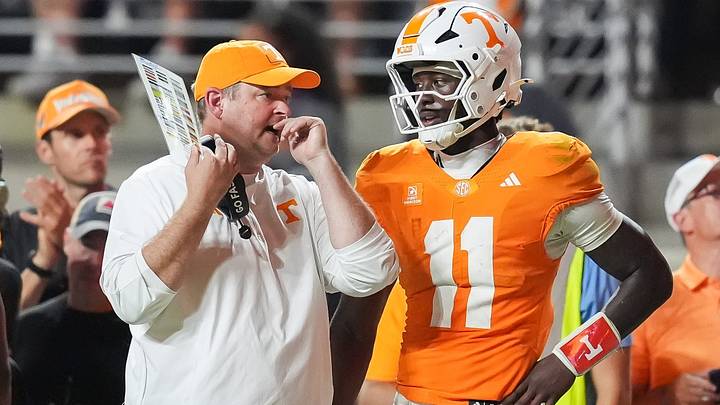 Sep 19, 2026; Knoxville, Tennessee, USA;  Tennessee coach Josh Heupel chats with Tennessee quarterback Faizon Brandon (11) during Tennesseea?TMs college football game against Kennesaw State at Neyland Stadium in Knoxville on Sept. 19, 2026.  Mandatory Credit: Saul Young/News Sentinel-USA TODAY NETWORK via Imagn Images