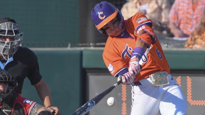 Clemson infielder Josh Paino (8) bats against University of Louisville during the bottom of the fifth inning at Doug Kingsmore Stadum in Clemson, S.C. Friday, April 18, 2025.