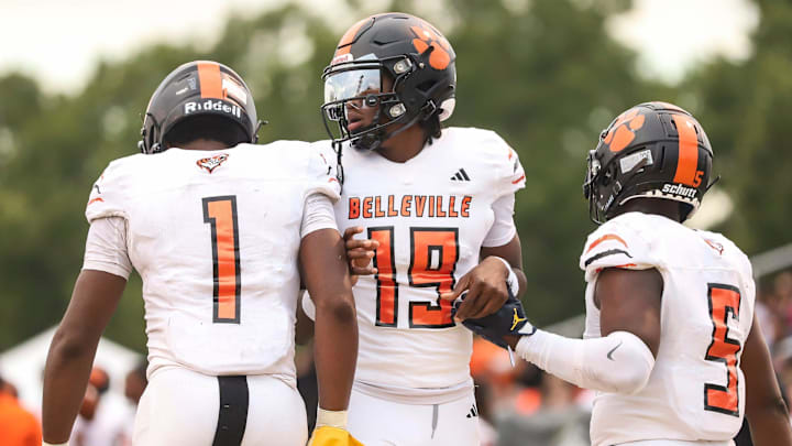 Belleville quarterback Bryce Underwood (19) celebrates a touchdown scored by running back Jeremiah Beasley (1) during the first half against River Rouge at Prep Kickoff Classic at Wayne State University's Tom Adams Field in Detroi on Friday, August 25, 2023. Belleville quarterback Bryce Underwood (19) celebrates a touchdown scored by running back Jeremiah Beasley (1) during the first half against River Rouge at Prep Kickoff Classic at Wayne State University's Tom Adams Field in Detroi on Friday, August 25, 2023.