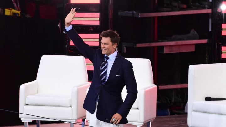 Jun 12, 2024; Foxborough, MA, USA; Former Patriots quarterback Tom Brady is introduced to fans during his Patriots Hall of Fame induction ceremony. Mandatory Credit: Eric Canha-USA TODAY Sports