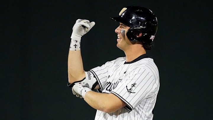 Vanderbilt first baseman Riley Nelson (32) celebrates his double against Xavier during the seventh inning at Hawkins Field in Nashville, Tenn., Friday, March 7, 2025. Vanderbilt won 15-3 in seven innings.