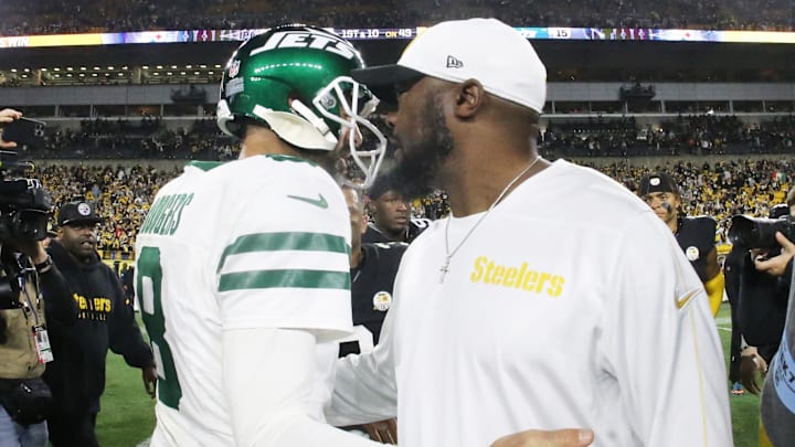 Oct 20, 2024; Pittsburgh, Pennsylvania, USA;  New York Jets quarterback Aaron Rodgers (8) and Pittsburgh Steelers head coach Mike Tomlin (right) greet each other after their game at Acrisure Stadium. Mandatory Credit: Charles LeClaire-Imagn Images