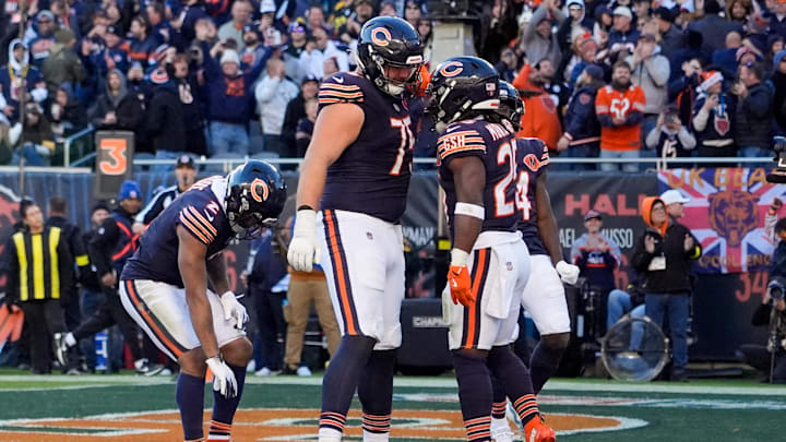 Nov 23, 2025; Chicago, Illinois, USA; Chicago Bears running back Kyle Monangai (25) reacts with offensive tackle Ozzy Trapilo (75) after scoring a touchdown against the Pittsburgh Steelers during the second half at Soldier Field. Mandatory Credit: David Banks-Imagn Images Nov 23, 2025; Chicago, Illinois, USA; Chicago Bears running back Kyle Monangai (25) reacts with offensive tackle Ozzy Trapilo (75) after scoring a touchdown against the Pittsburgh Steelers during the second half at Soldier Field. Mandatory Credit: David Banks-Imagn Images