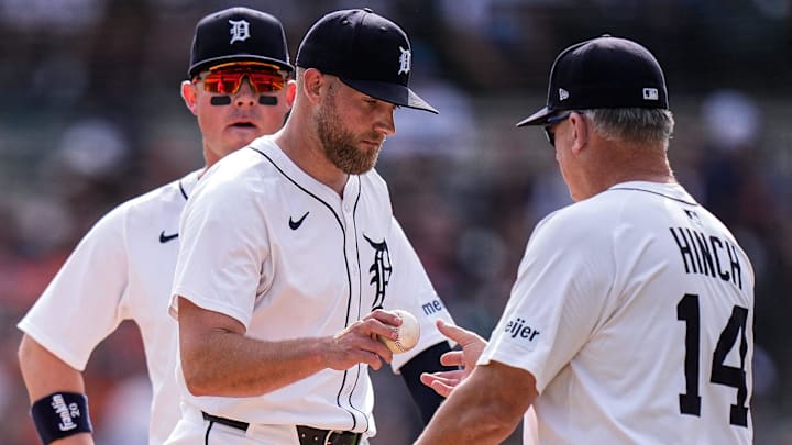 Detroit Tigers pitcher Will Vest (19) hands the ball to manager A.J. Hinch (14) for a pitching change against Atlanta Braves during the ninth inning at Comerica Park in Detroit on Saturday, Sept. 20, 2025.