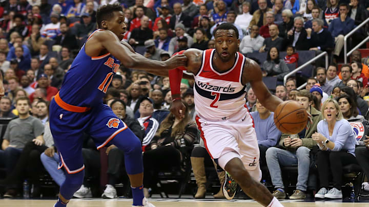 Jan 3, 2018; Washington, DC, USA; Washington Wizards guard John Wall (2) drives to the basket as New York Knicks guard Frank Ntilikina (11) defends in the fourth quarter at Capital One Arena. The Wizards won 121-103. Mandatory Credit: Geoff Burke-Imagn Images Jan 3, 2018; Washington, DC, USA; Washington Wizards guard John Wall (2) drives to the basket as New York Knicks guard Frank Ntilikina (11) defends in the fourth quarter at Capital One Arena. The Wizards won 121-103. Mandatory Credit: Geoff Burke-Imagn Images
