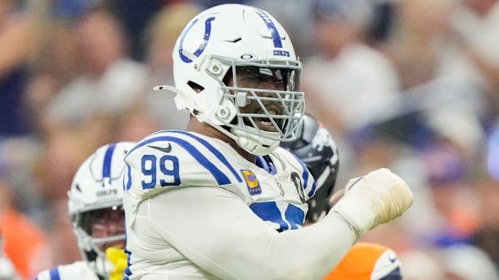 Indianapolis Colts defensive tackle DeForest Buckner (99) celebrates after bringing down Denver Broncos quarterback Bo Nix (10) on Sunday, Sept. 14, 2025, during a game at Lucas Oil Stadium in Indianapolis.