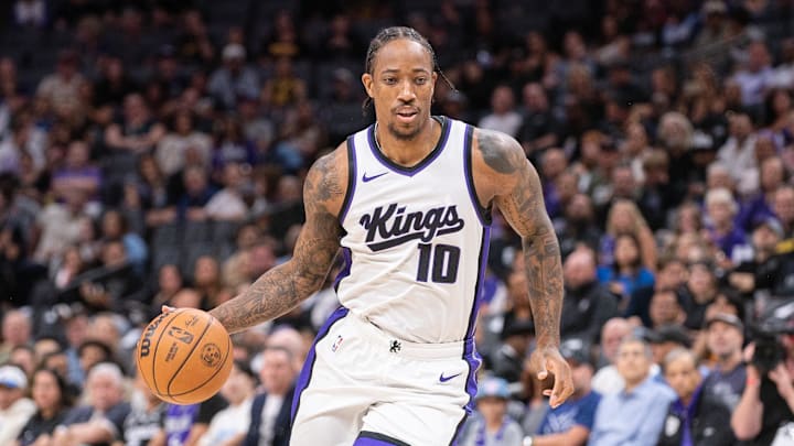 Oct 9, 2024; Sacramento, California, USA; Sacramento Kings forward DeMar DeRozan (10) controls the ball against the Golden State Warriors during the first quarter at Golden 1 Center. Mandatory Credit: Ed Szczepanski-Imagn Images