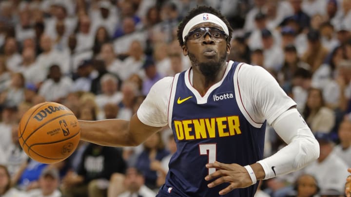 May 12, 2024; Minneapolis, Minnesota, USA; Denver Nuggets guard Reggie Jackson (7) goes to the basket against the Minnesota Timberwolves in the first quarter of game four of the second round for the 2024 NBA playoffs at Target Center. Mandatory Credit: Bruce Kluckhohn-USA TODAY Sports