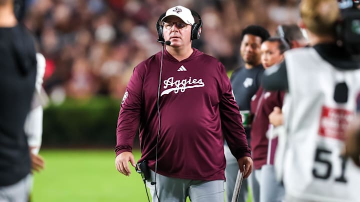 Nov 2, 2024; Columbia, South Carolina, USA; Texas A&M Aggies head coach Mike Elko directs his team against the South Carolina Gamecocks in the second quarter at Williams-Brice Stadium. Mandatory Credit: Jeff Blake-Imagn Images