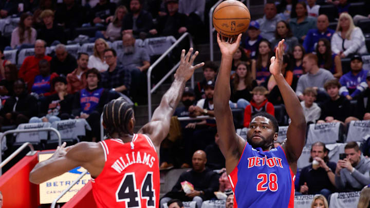 Oct 28, 2023; Detroit, Michigan, USA;  Detroit Pistons center Isaiah Stewart (28) shoots on Chicago Bulls forward Patrick Williams (44) in the first half at Little Caesars Arena. Mandatory Credit: Rick Osentoski-Imagn Images