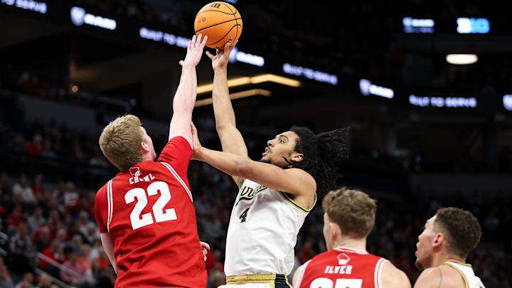 Mar 16, 2024; Minneapolis, MN, USA; Purdue Boilermakers forward Trey Kaufman-Renn (4) shoots as