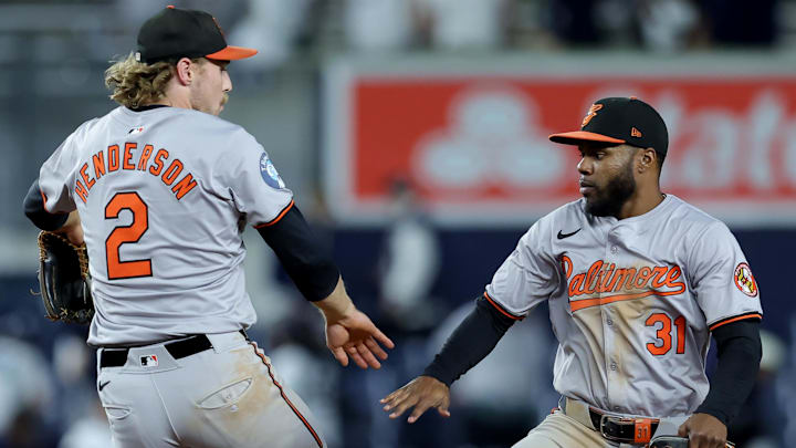 Sep 25, 2024; Bronx, New York, USA; Baltimore Orioles shortstop Gunnar Henderson (2) and center fielder Cedric Mullins (31) celebrate after defeating the New York Yankees at Yankee Stadium.