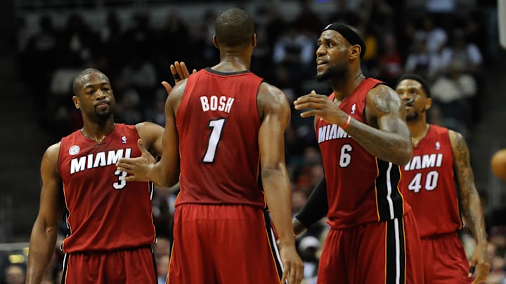 Mar 15, 2013; Milwaukee, WI, USA; Miami Heat forward LeBron James (6) reacts with center Chris Bosh (1) and guard Dwyane Wade (3) after a Heat basket during the game against the Milwaukee Bucks at the Bradley Center. The Heat beat the Bucks 107-94. Mandatory Credit: Benny Sieu-Imagn Images Mar 15, 2013; Milwaukee, WI, USA; Miami Heat forward LeBron James (6) reacts with center Chris Bosh (1) and guard Dwyane Wade (3) after a Heat basket during the game against the Milwaukee Bucks at the Bradley Center. The Heat beat the Bucks 107-94. Mandatory Credit: Benny Sieu-Imagn Images