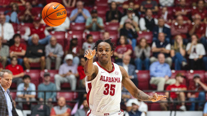 Nov 11, 2024; Tuscaloosa, Alabama, USA; Alabama Crimson Tide forward Derrion Reid (35) passes the ball against the McNeese State Cowboys during the first half at Coleman Coliseum. Mandatory Credit: Will McLelland-Imagn Images Nov 11, 2024; Tuscaloosa, Alabama, USA; Alabama Crimson Tide forward Derrion Reid (35) passes the ball against the McNeese State Cowboys during the first half at Coleman Coliseum. Mandatory Credit: Will McLelland-Imagn Images