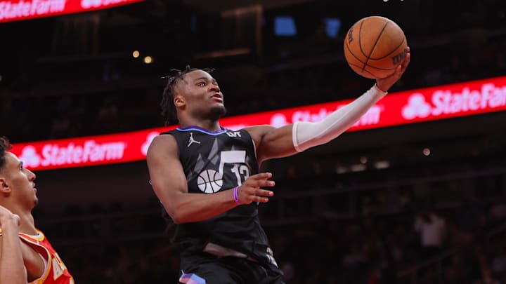 Apr 6, 2025; Atlanta, Georgia, USA; Utah Jazz guard Isaiah Collier (13) shoots against the Atlanta Hawks in the third quarter at State Farm Arena. Mandatory Credit: Brett Davis-Imagn Images