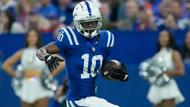 Indianapolis Colts wide receiver Adonai Mitchell (10) rushes the ball Sunday, Nov. 10, 2024, during a game against the Buffalo Bills at Lucas Oil Stadium in Indianapolis. Indianapolis Colts wide receiver Adonai Mitchell (10) rushes the ball Sunday, Nov. 10, 2024, during a game against the Buffalo Bills at Lucas Oil Stadium in Indianapolis.