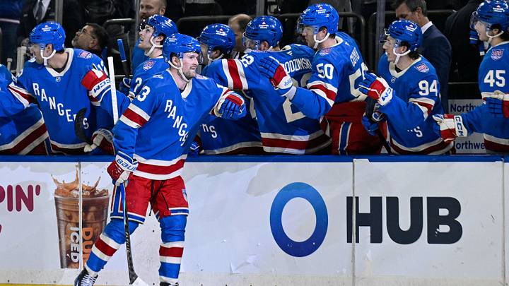 Apr 8, 2026; New York, New York, USA; New York Rangers left wing Alexis Lafrenière (13) celebrates his goal against the Buffalo Sabres during the first period at Madison Square Garden. Mandatory Credit: Dennis Schneidler-Imagn Images