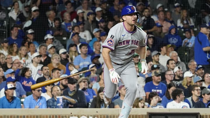 Sep 23, 2025; Chicago, Illinois, USA; New York Mets first baseman Pete Alonso (20) hits a RBI single against the Chicago Cubs during the sixth inning at Wrigley Field. Mandatory Credit: David Banks-Imagn Images Sep 23, 2025; Chicago, Illinois, USA; New York Mets first baseman Pete Alonso (20) hits a RBI single against the Chicago Cubs during the sixth inning at Wrigley Field. Mandatory Credit: David Banks-Imagn Images