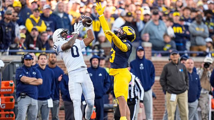 Penn State wide receiver Chase Sowell (0) makes a catch against Michigan cornerback Smith Snowden (3) Penn State wide receiver Chase Sowell (0) makes a catch against Michigan cornerback Smith Snowden (3)