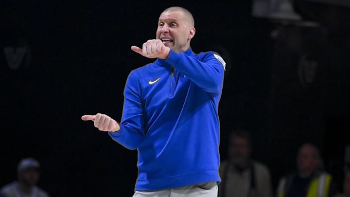 Jan 27, 2026; Nashville, Tennessee, USA;  Kentucky Wildcats head coach Mark Pope directs his team against the Vanderbilt Commodores during the first half at Memorial Gymnasium. Mandatory Credit: Steve Roberts-Imagn Images