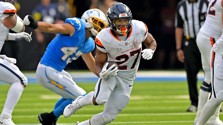 Sep 21, 2025; Inglewood, California, USA; Denver Broncos running back J.K. Dobbins (27) carries the ball in the second half against the Los Angeles Chargers at SoFi Stadium. Mandatory Credit: Jayne Kamin-Oncea-Imagn Images Sep 21, 2025; Inglewood, California, USA; Denver Broncos running back J.K. Dobbins (27) carries the ball in the second half against the Los Angeles Chargers at SoFi Stadium. Mandatory Credit: Jayne Kamin-Oncea-Imagn Images