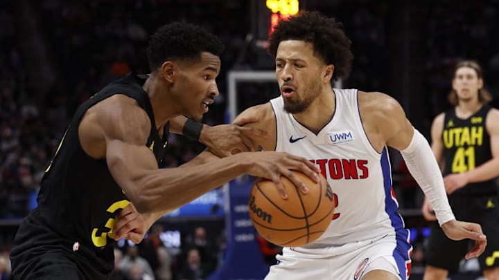 Dec 21, 2023; Detroit, Michigan, USA;  Utah Jazz guard Ochai Agbaji (30) dribbles defended by