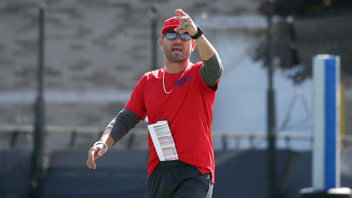 Buffalo Bills defensive coordinator Bobby Babich gives instructions to the defense during drills on day three of the Buffalo Bills training camp at St. John Fisher University in Pittsford, Friday, July 26, 2024.
